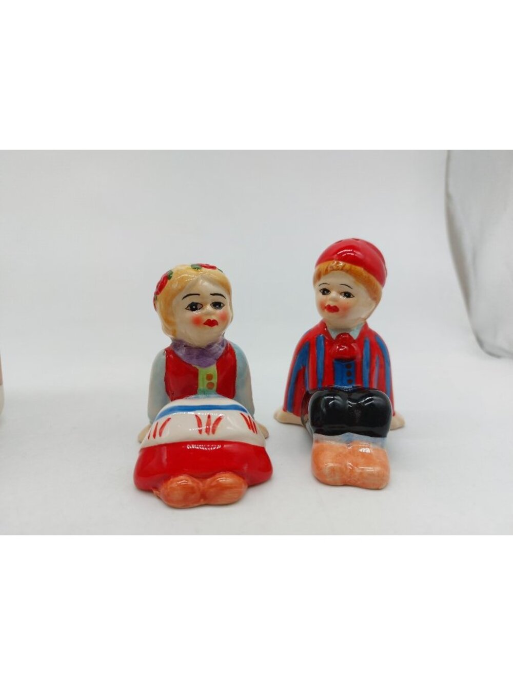 Swedish Couple Sitting Salt and Pepper Shaker READ